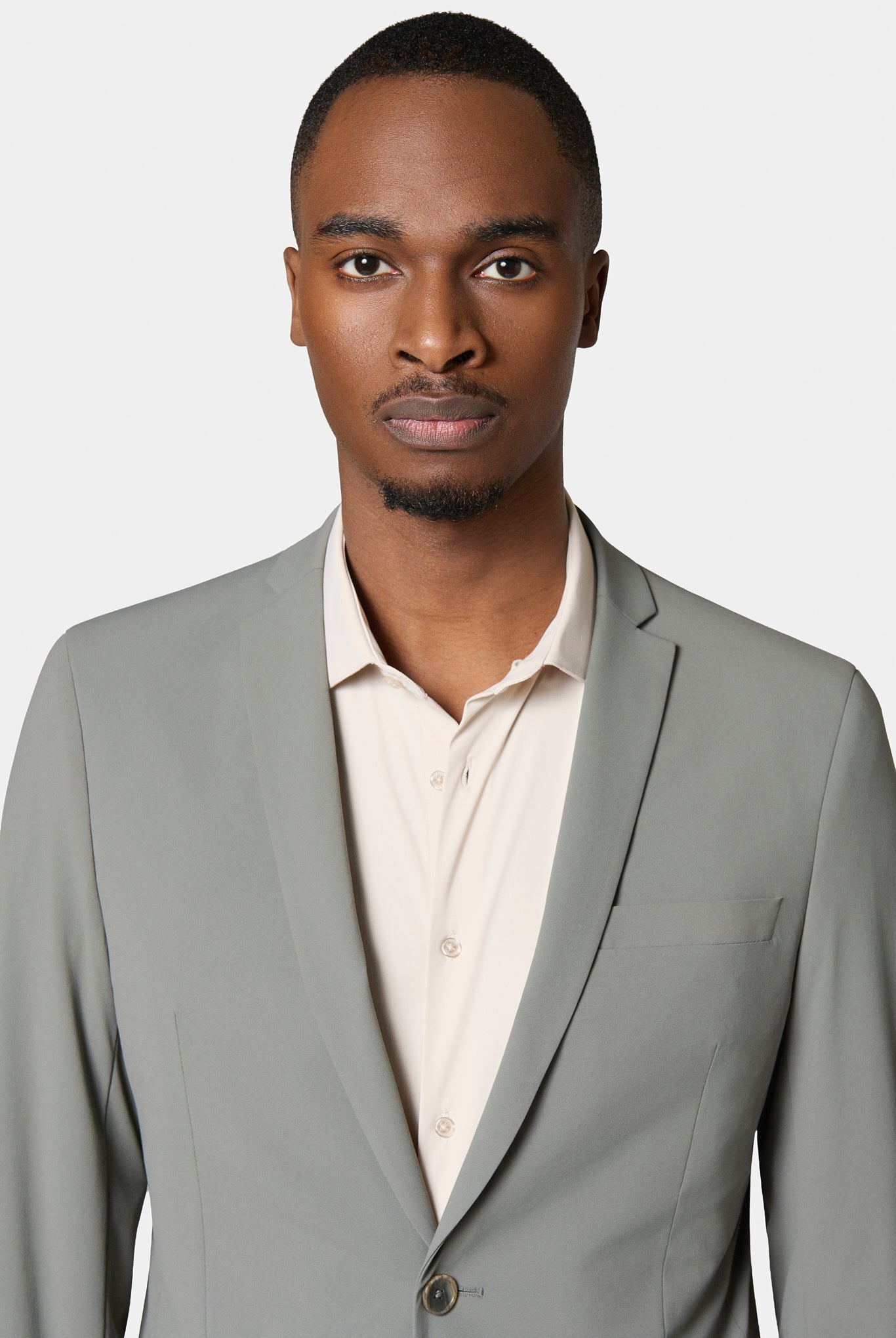 Veste de costume, maille technique Jerem, intérieur semi-doublé, poches passepoilées à rabat