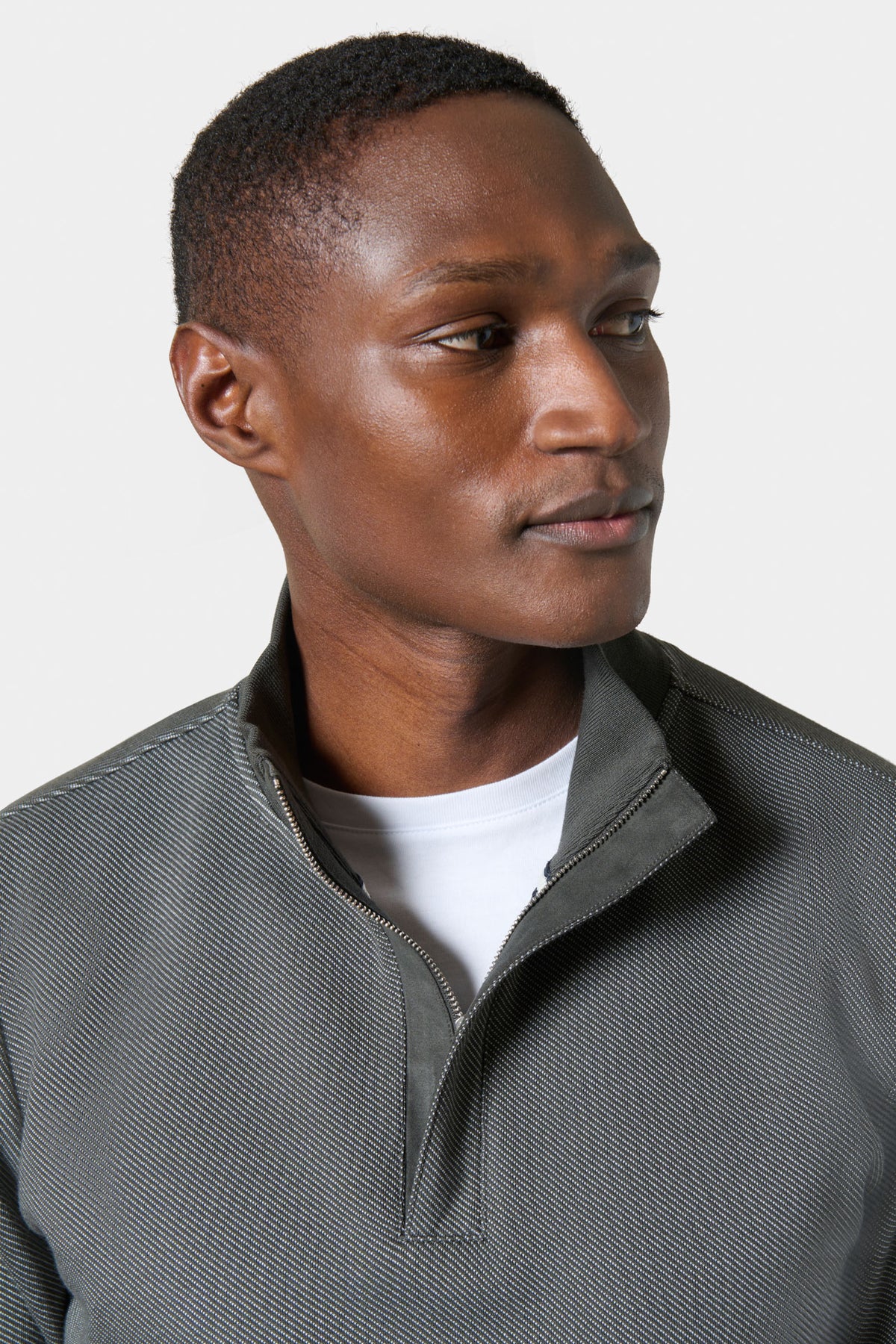 Polo de manga larga con cuello alto y cremallera en jacquard
