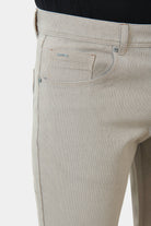 Pantalon cinq poches, tricotine stretch micro-motif Jerem, poches plaquées surpiquées