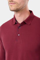 ligne jerem casual 
 col classique 
 fermeture à 3 boutons 
 ligne fine contrasté sur patte de boutonnage 
 manche longue 
 bas de manche en bord cùte 
 fente cùté contrasté